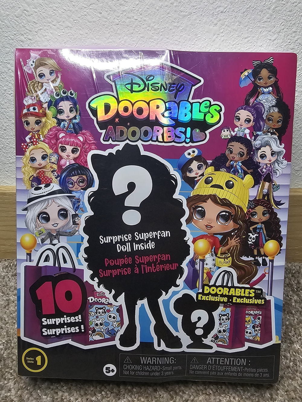 Disney Doorables Adoorbs! Surprise Superfan Doll - Pink & Purple Packaging
